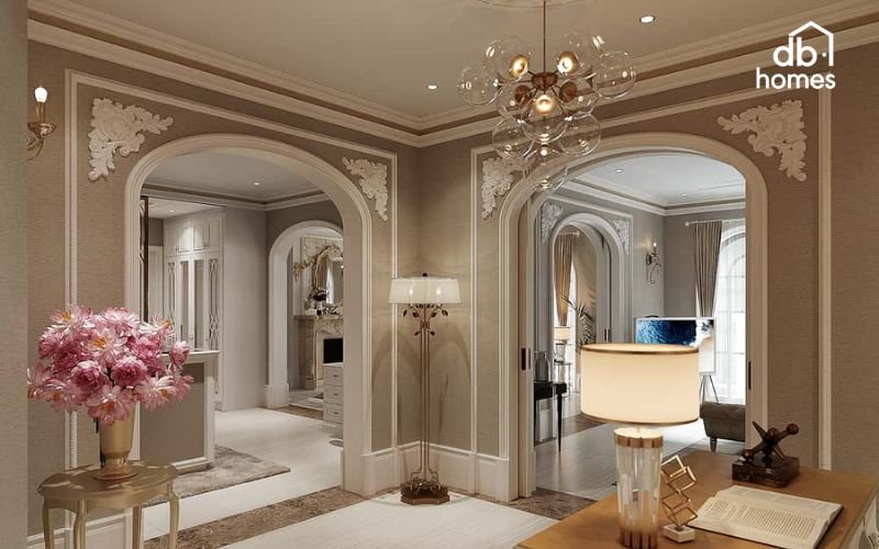 Không gian mở giữa các phòng được nhấn mạnh bằng đèn trang trí có họa tiết sang trọng