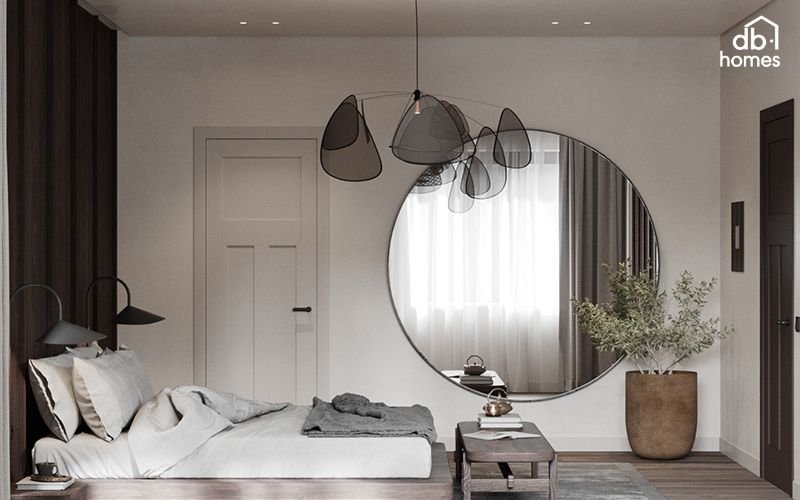 Gương giúp mở rộng không gian và phản chiếu ánh sáng, làm cho phòng ngủ trở nên sáng hơn tự nhiên