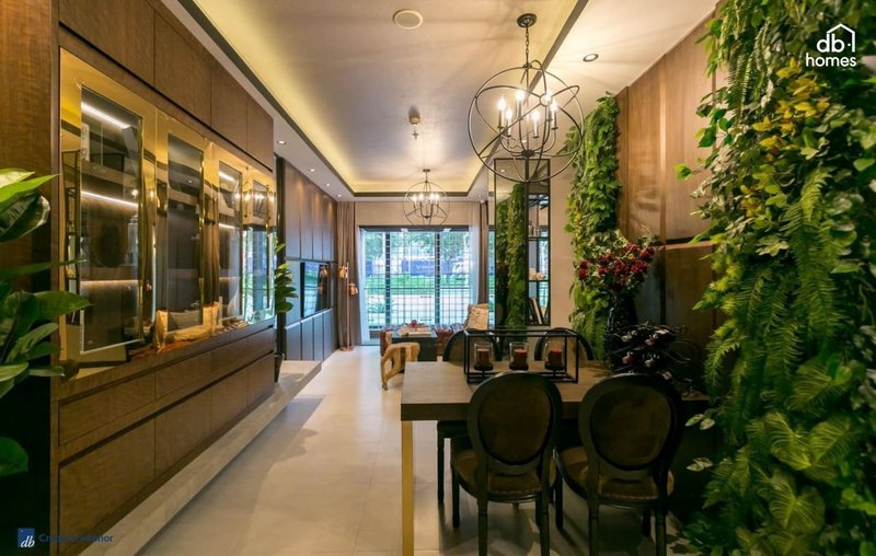 Thiết kế nội thất phòng khách chung cư với thiết kế nội thất xanh, sofa màu lá cây và không gian sáng tạo sự gần gũi với thiên nhiên