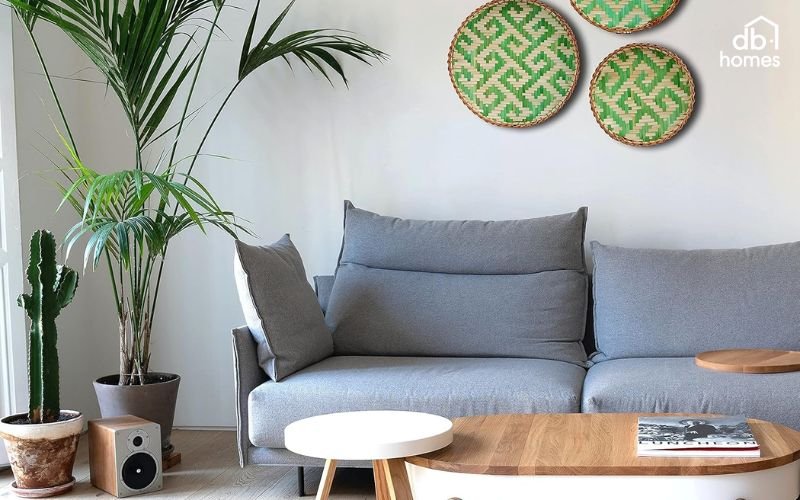 Đặt cây xanh ở góc để phòng khách trở nên mềm mại và hài hòa hơn