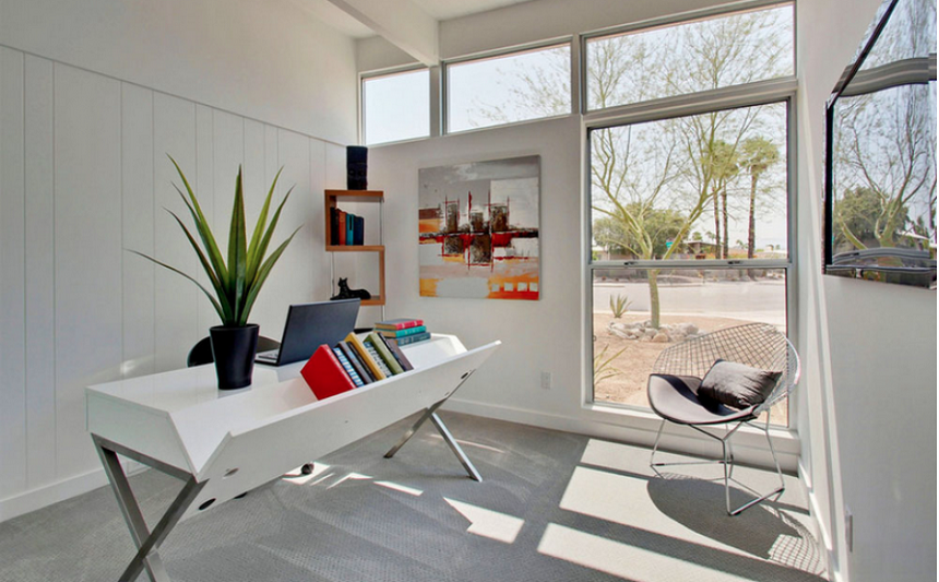 Thiết kế phòng làm việc tại nhà sẽ giúp cho bạn tận dụng tối đa không gian sống trong thời gian giãn cách xã hội. Hãy xem ảnh này để thấy sự sắp xếp thông minh và sự hài hòa giữa màu sắc và ánh sáng.